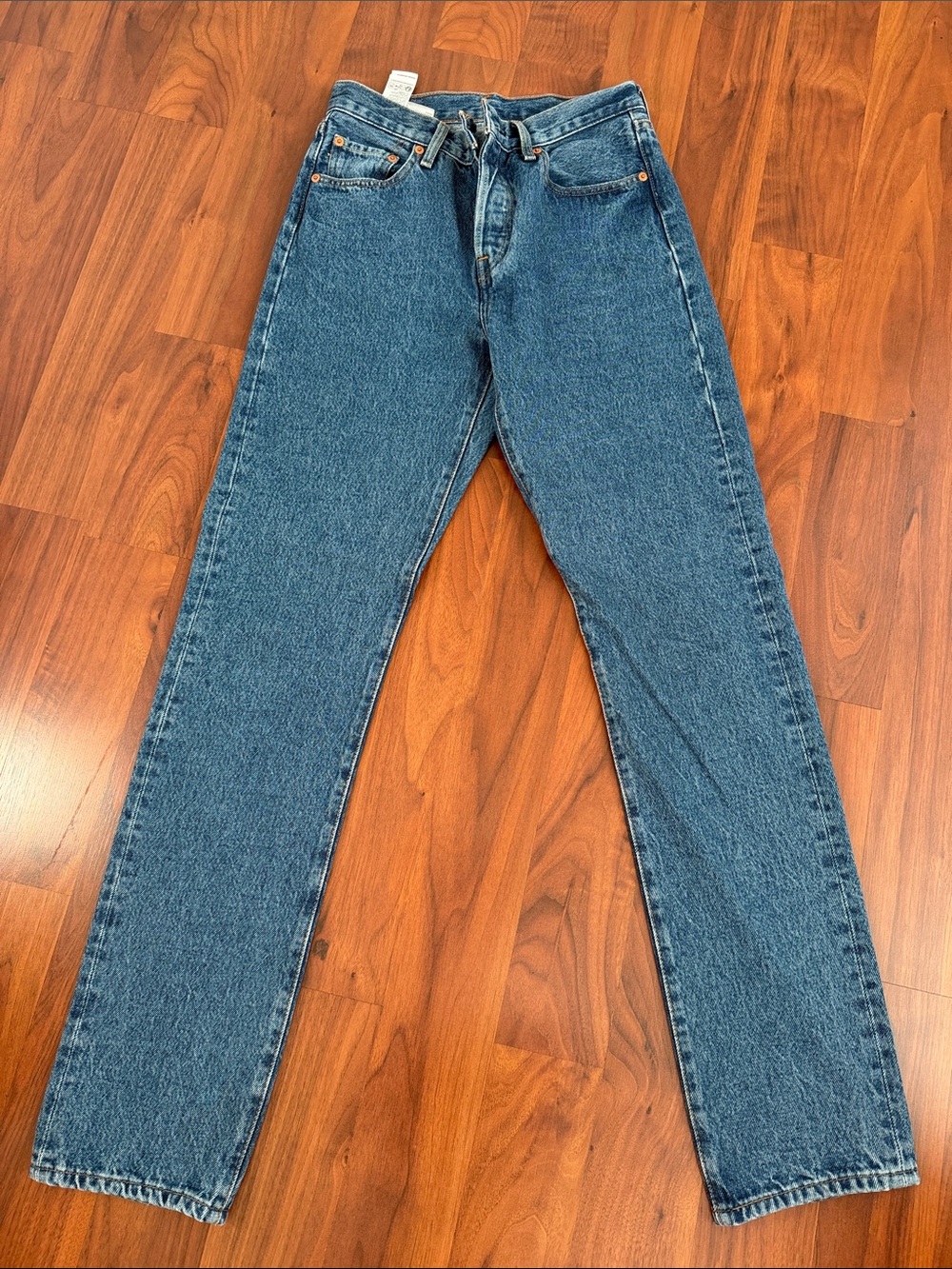 Women’s Levi’s Blue High Rise Straight-Leg Jeans. 25”W x 32”L.
